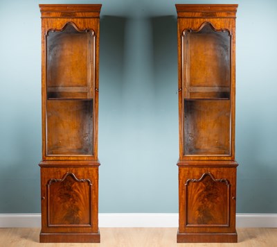 Lot 1046 - A pair of Victorian mahogany narrow bookcases