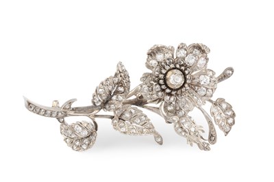 Lot A diamond floral spray brooch, designed as an '...