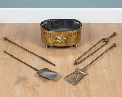 Lot 286 - A collection of brass fireside implements