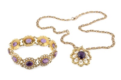 Lot 85 - An amethyst and cultured pearl cluster pendant...