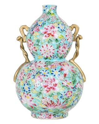 Lot 1071 - A Chinese polychrome double-gourd vase