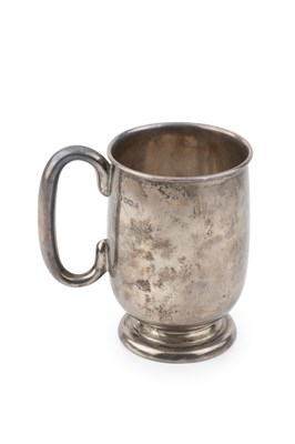 Lot 659 - A silver pint mug, of plain, slightly bowed...