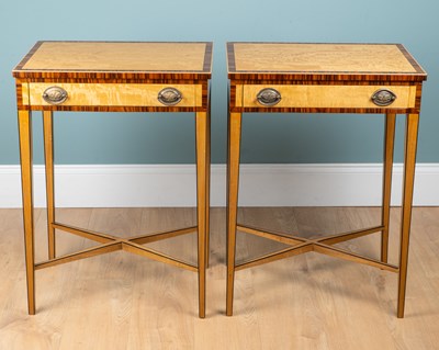 Lot 150 - A pair of satinwood side tables