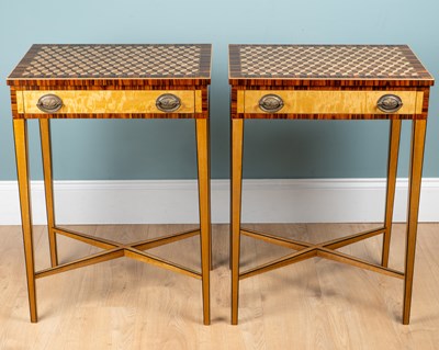 Lot 155 - A pair of satinwood side tables