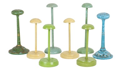 Lot 104 - A group of eight painted hat stands