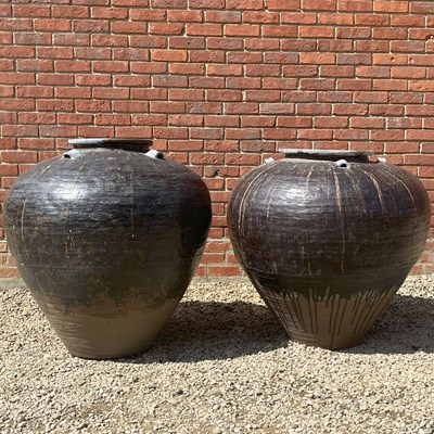 Lot 1387 - A pair of large Indian ceramic jars