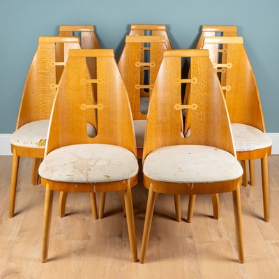 Lot A set of eight satinwood dining chairs by Johnny Grey