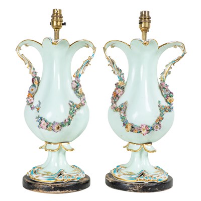 Lot 352 - A pair of flower-encrusted porcelain vases converted for use as table lamps