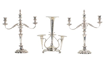 Lot 398 - A pair of silver-plated candelabra, together with a table centre
