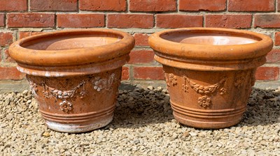 Lot 1279 - A pair of cast terracotta garden planters
