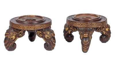 Lot 1242 - A pair of pot stands