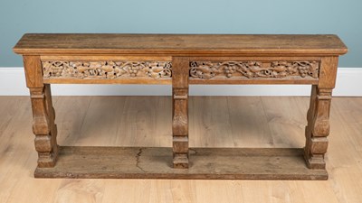 Lot 327 - In the manner of Lutyens, an early 20th century oak carved altar rail