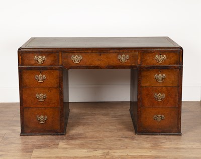 Lot 65 - Walnut veneered desk 1930s, three over six...