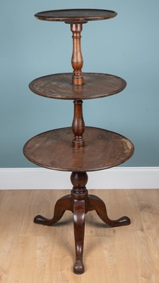 Lot 1197 - A 19th century mahogany three-tier dumb waiter