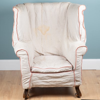 Lot 1083 - A 19th-century wingback armchair