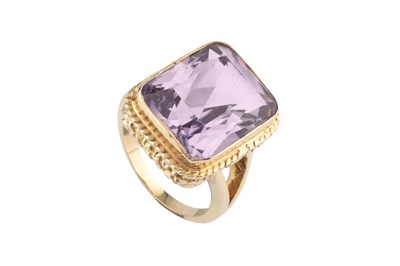 Lot 75 - An amethyst single stone ring, the...