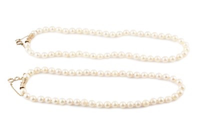 Lot 416 - Two cultured pearl necklaces, each designed as...