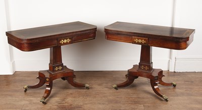 Lot Pair of rosewood and brass inlaid card tables...