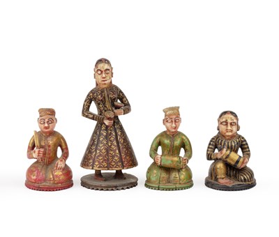 Lot Group of four painted bone miniature figures...