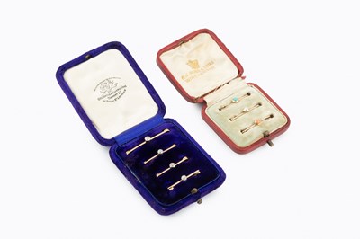 Lot 233 - A cased set of four diamond set bar brooches,...