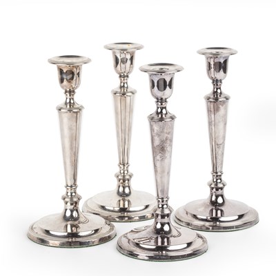 Lot 421 - Set of four silver-plated candlesticks Of...