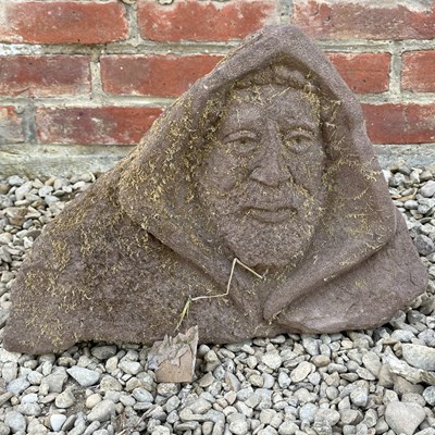 Lot 1332 - A hand-carved stone corbel