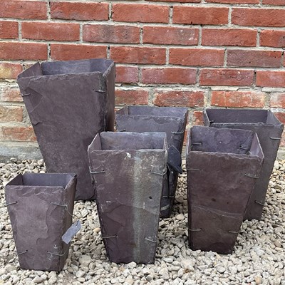 Lot 1290 - A collection of six handmade, hand-cut Welsh slate planters