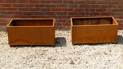 Lot 1349 - A pair of steel planters