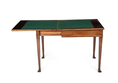 Lot 479 - An Edwardian mahogany fold-over games table