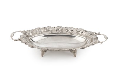 Lot 670 - An Eastern white metal oval dish, embossed...
