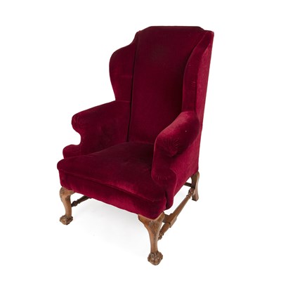 Lot 1012 - A Georgian-style wingback armchair