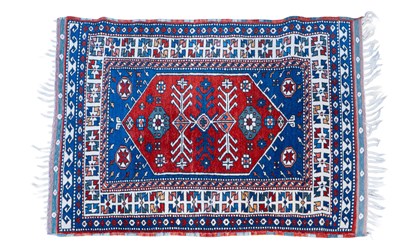 Lot 1078 - A mid-20th century hand-woven, vegetable-dyed Turkish rug