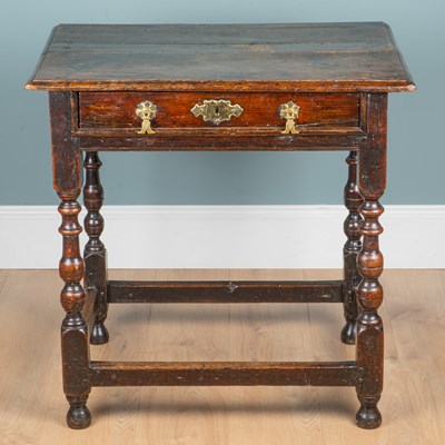 Lot 1175 - An 18th century oak side table