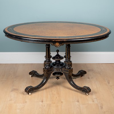 Lot 1301 - A burr oak and ebonised Aesthetic centre table