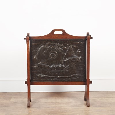 Lot 40 - Arts and Crafts  Oak-framed firescreen, with...