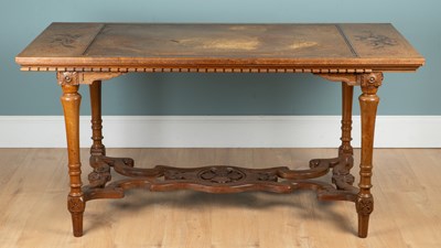 Lot 348 - An early 20th century walnut inlaid library table