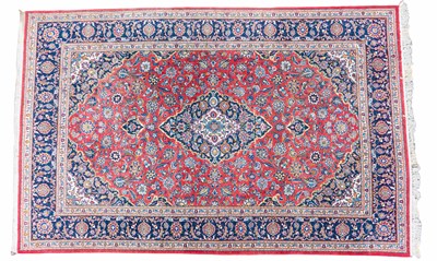 Lot 1187 - A hand-woven Kashan carpet
