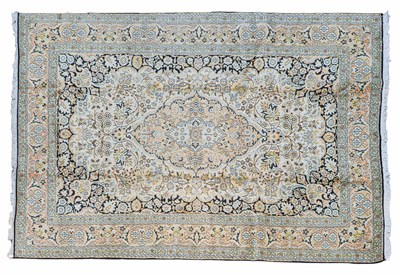Lot 1125 - A hand-woven silk Kerman carpet