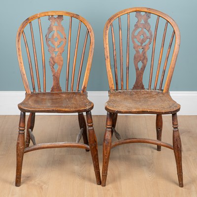 Lot 1189 - Two Georgian yew and elm Windsor chairs