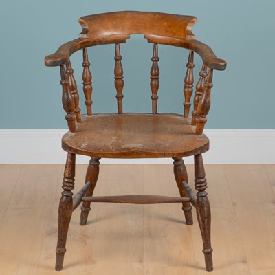 Lot 1159 - A 19th century elm-seated smoker's chair