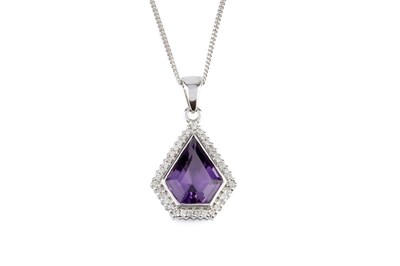 Lot 82 - An amethyst and diamond pendant on chain, the...