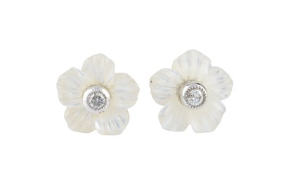 Lot 242 - A pair of gem set ear studs, each designed as...