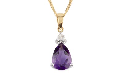 Lot 77 - An amethyst and diamond pendant on chain, the...