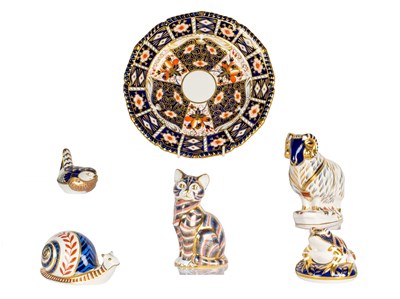 Lot 97 - A group of Royal Crown Derby paperweights and an Imari plate