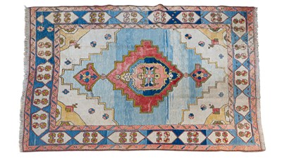 Lot 1048 - A mid-20th century hand-woven Kazak rug