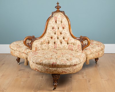 Lot 516 - A Victorian walnut-framed conversation seat