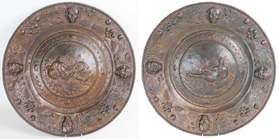 Lot 1160 - A pair of large 19th century pressed brass decorative chargers