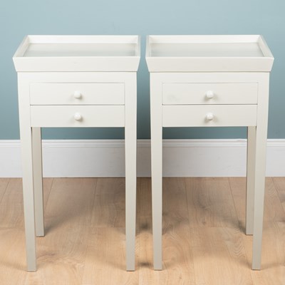 Lot 196 - A pair of dove grey tray-top bedside or lamp tables retailed by OKA