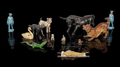 Lot 1332 - A collection of tin animals and figures