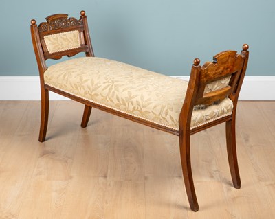 Lot 1346 - An Edwardian Aesthetic Movement walnut window seat